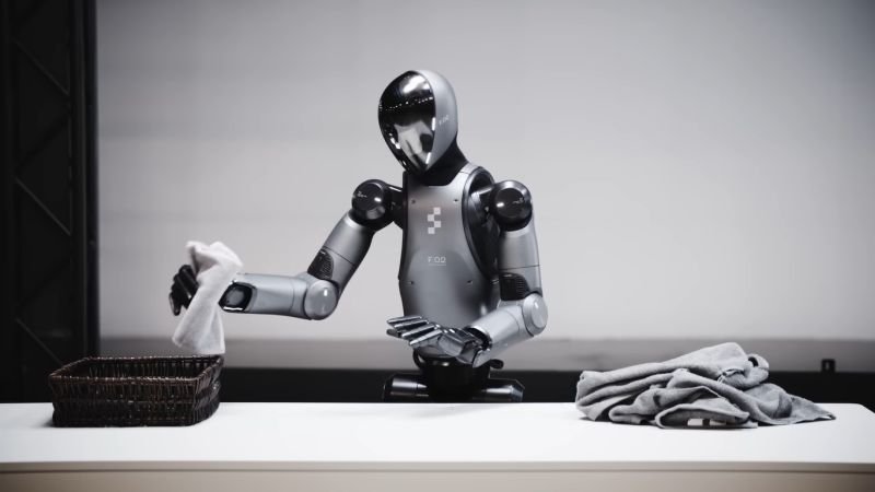 Robô humanoide da Figure dobra roupa com IA Helix e avança nas tarefas domésticas Robô humanoide da Figure dobra roupa com IA Helix e avança nas tarefas domésticas - Imagem do artigo original